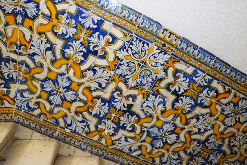 Azulejos lining staircase wall in University of Coimbra Tour
