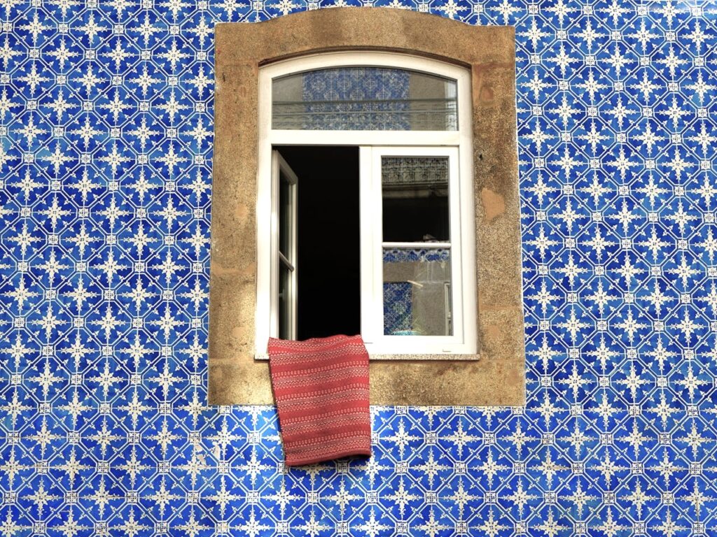 Blue Mosaic on Wall around Windows