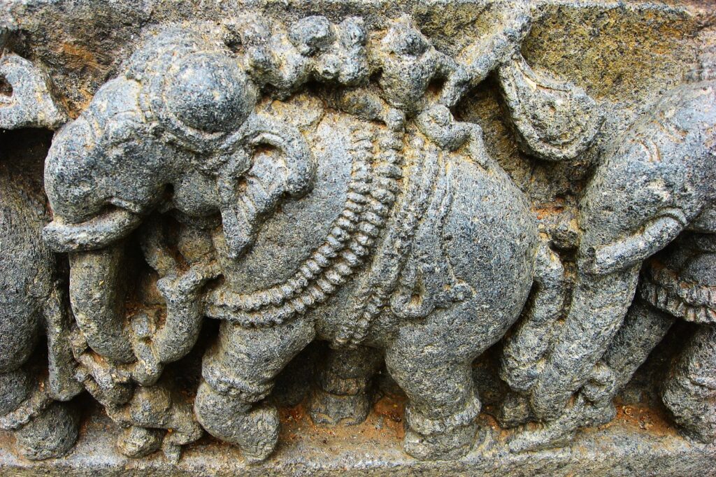 Close up image of Elephant statue in the Horizontal band in Hoysala Temple Base
