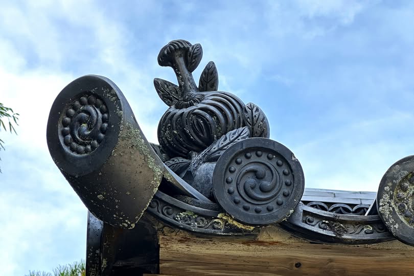 close-up view of Japanese Kawara roof tiles, featuring intricate spiral patterns 