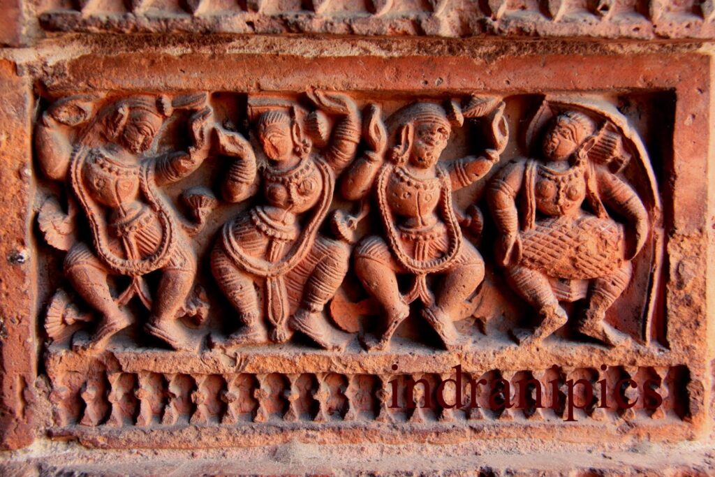 Dancing Figures on terracotta panel