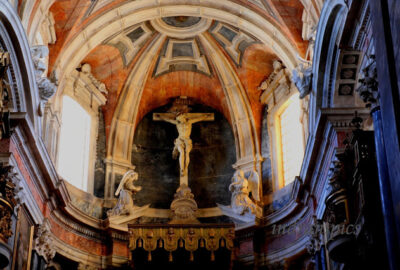 Observe carefully to see the muscular Jesus made of wood.