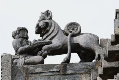 Mythical founder, Sala, stabbing a lion-like creature with a dagger - Emblem of Hoysala Empire