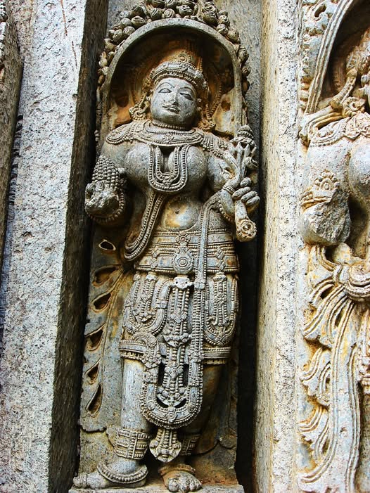 Notice the detailed ornaments on the statue