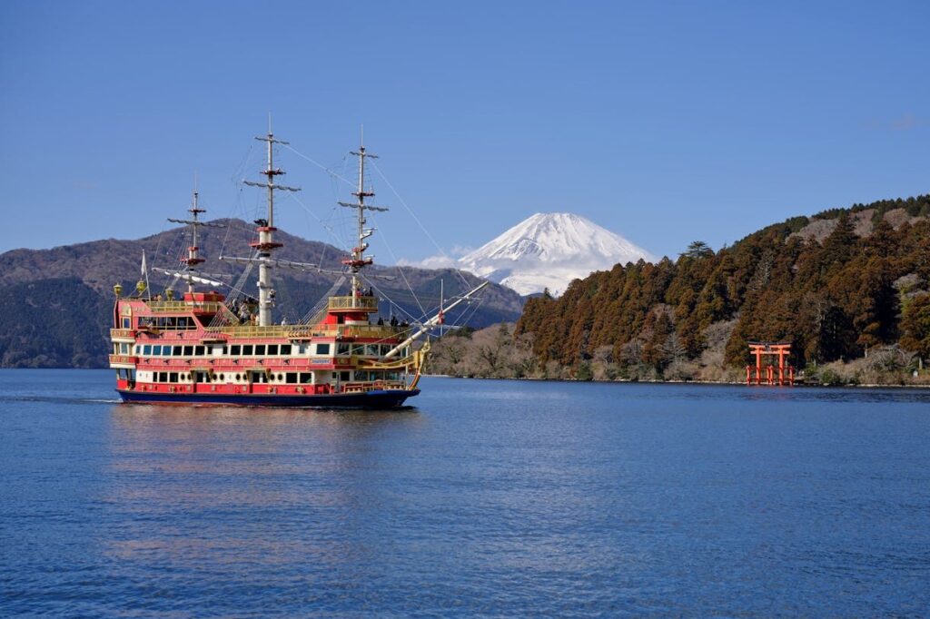 Pirate ship sailing on Lake Ashi with Mount Fuji in the background - Hakone is worth visiting