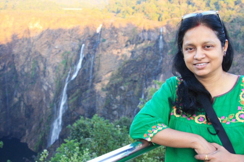 Posing for a picture with Jog Waterfalls