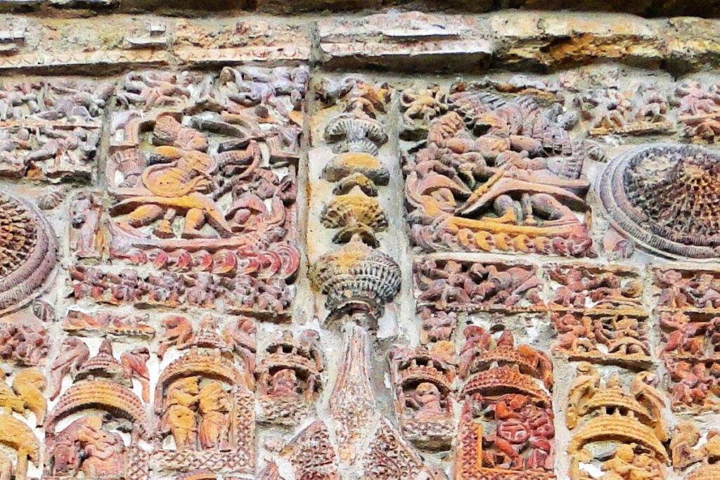 Ramayana Battle Scene on the terracotta panel above arch
