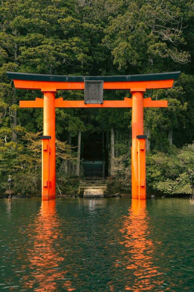 Torii gate reflecting on Lake Ashi