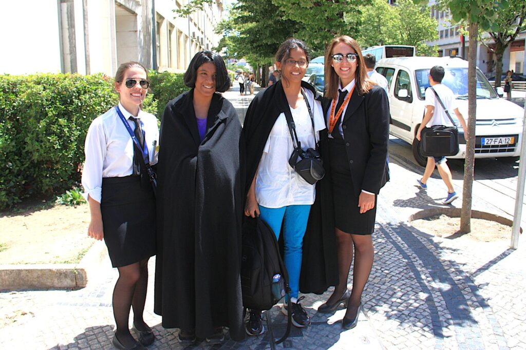 Traditional black capes of Coimbra University