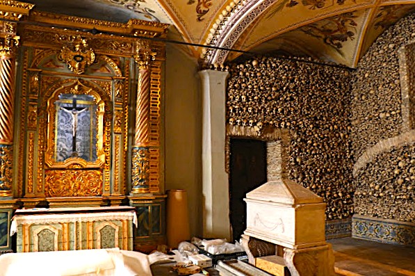 The white box has bones of the monks who made this chapel of bones in Evora